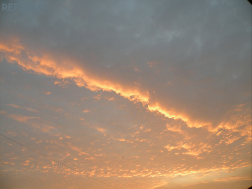 写真：朝焼けの空の画像
